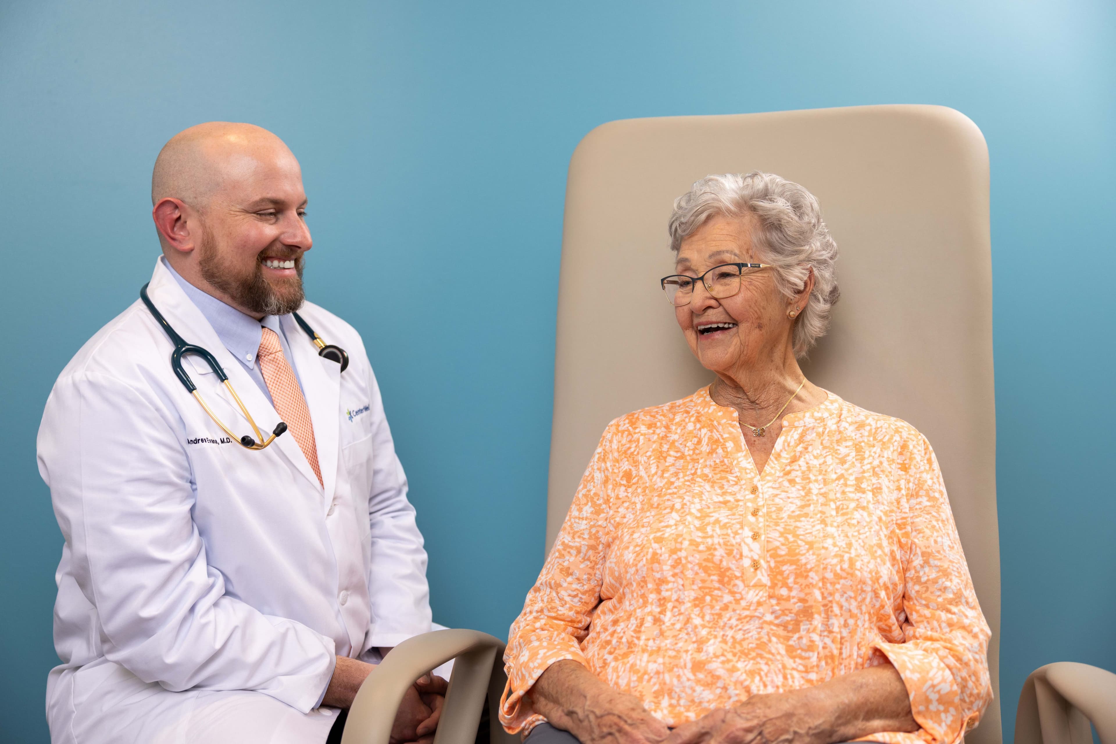 Woman sitting with her doctor